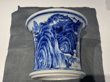 A fine Chinese blue, white and copper red 'Master of the Rocks' brush pot, Kangxi